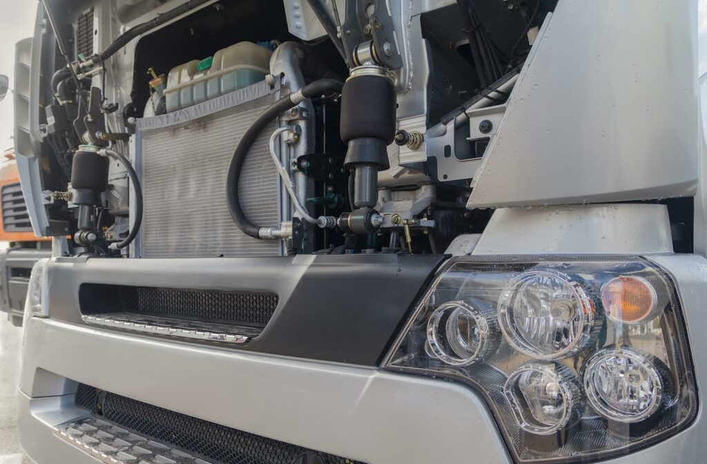 The front of a heavy duty truck exposing the radiator.