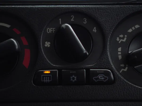 Heaters control panel with dials and indicator lights for vehicle operation