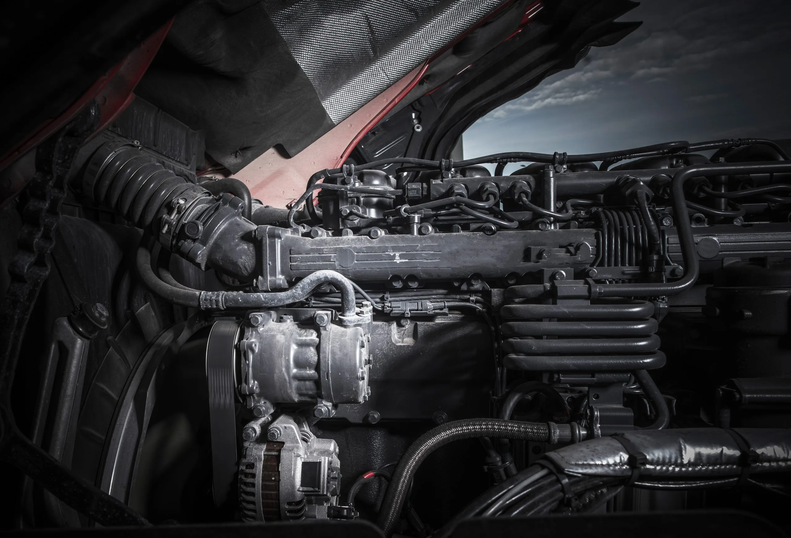 A close-up view reveals intricate machinery and wiring of an engine